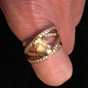Citrine ring with diamond accent swirls